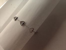 Bracelet coeurs argenté très bon état 