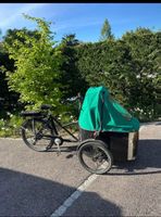 Vélo cargo d'occasion en bon état, idéal pour famille