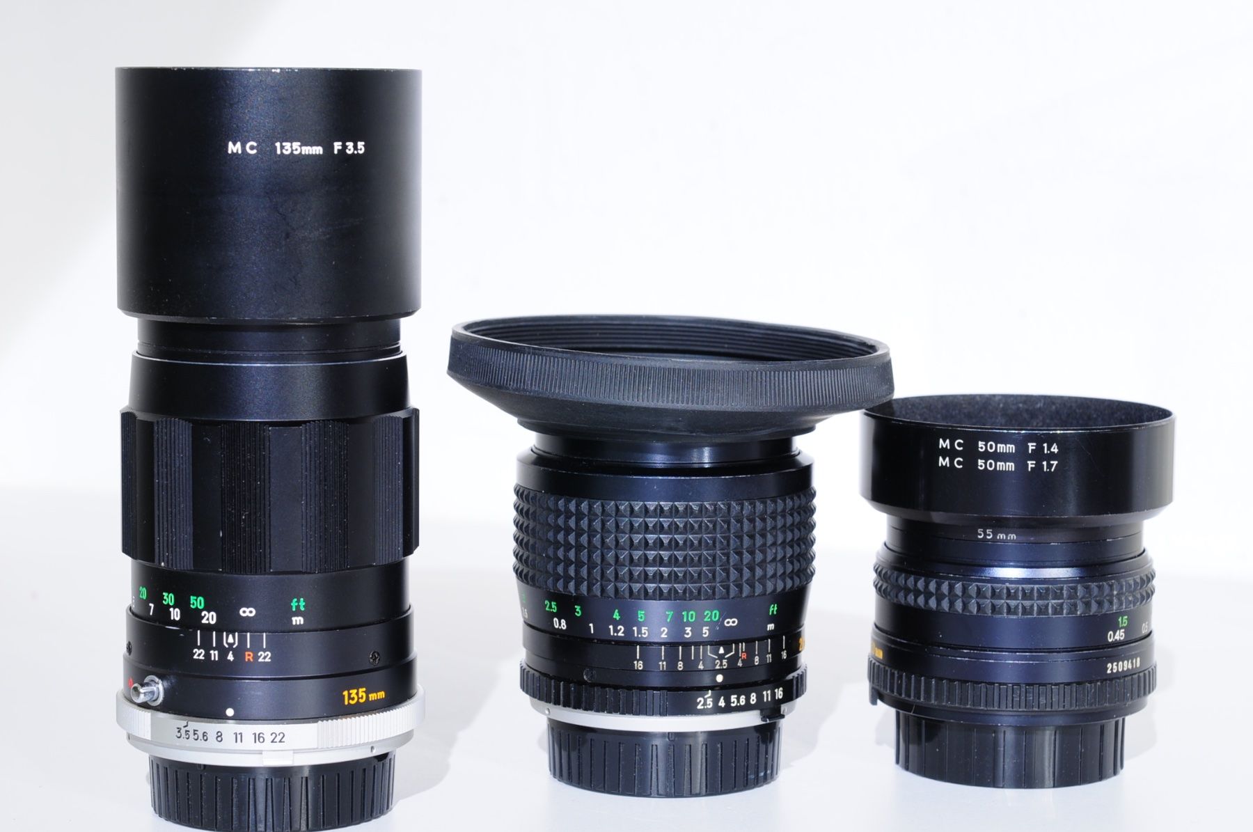 Minolta Obiettivi: 3 Minolta Objektive MC, MD Rokkor top Zustand – Usato da Rheinfelden venduto da Fotomechaniker-AD 3