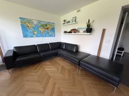 Grosses Ledersofa schwarz mit Hocker/Erweiterung