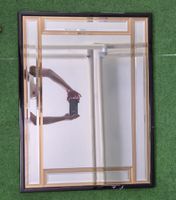 Miroir mural design art deco, cadre noir et biseautage