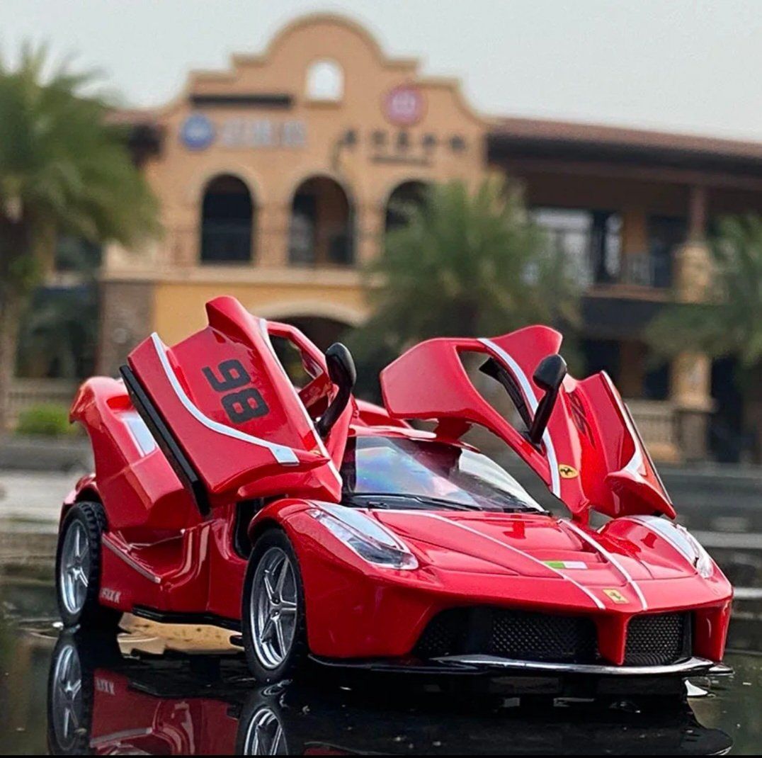 Ferrari Modellini d'auto: Ferrari Laferrari Modellauto 1/32 – Nuovo e nell'imballaggio originale da Ettingen venduto da SwissHellcat 1