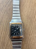 Montre Omega Seamaster carrée acier cadran noir état usagé