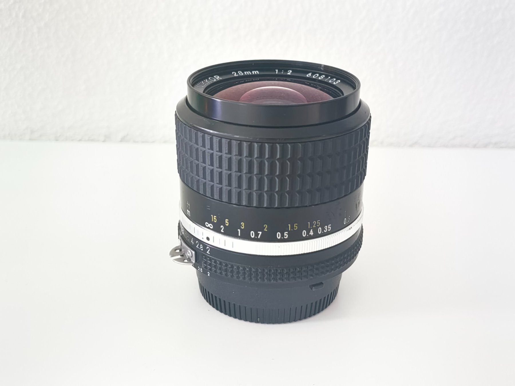 Nikkor Obiettivi: Nikkor Objectiv 28 mm f2 MF – Usato da Mols venduto da armanwalensee 1