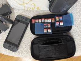 Nintendo Switch grise avec 15 jeux et accessoires