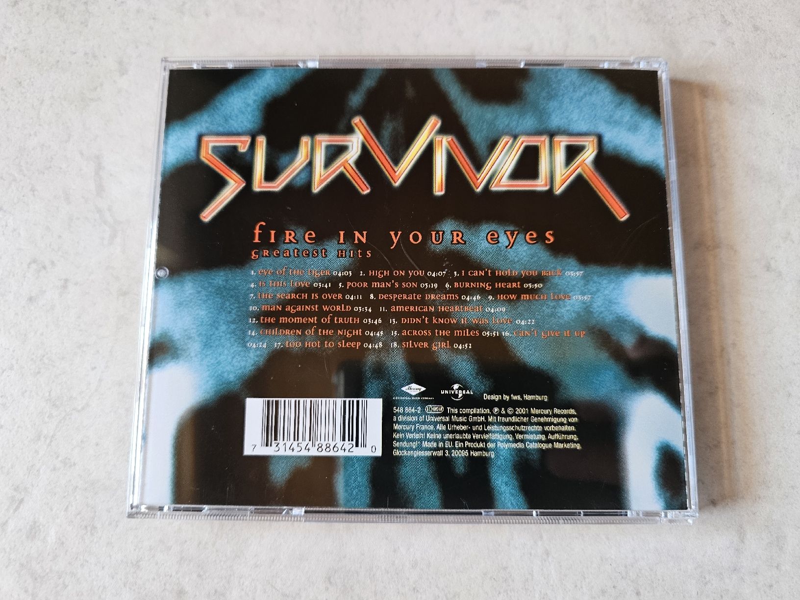 CDs: Survivor  -  Fire In Your Eyes  /  Greatest Hits – Gebraucht aus Schneisingen von backstore24 1