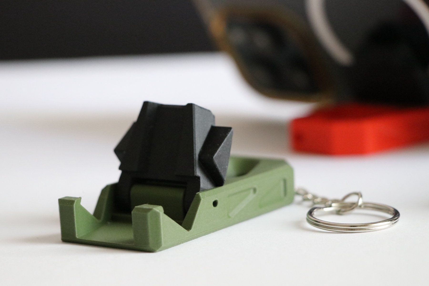 Staffe: Handyhalter Schlüsselanhänger Klappbar – Nuovo e nell'imballaggio originale da Winterthur venduto da Printfusion 2