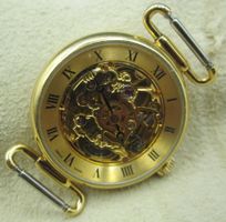 Montre remontage manuel Squelette, dorée, diamètre 25.66 mm