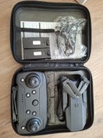 Drone E88 Pro avec télécommande et accessoires, état neuf