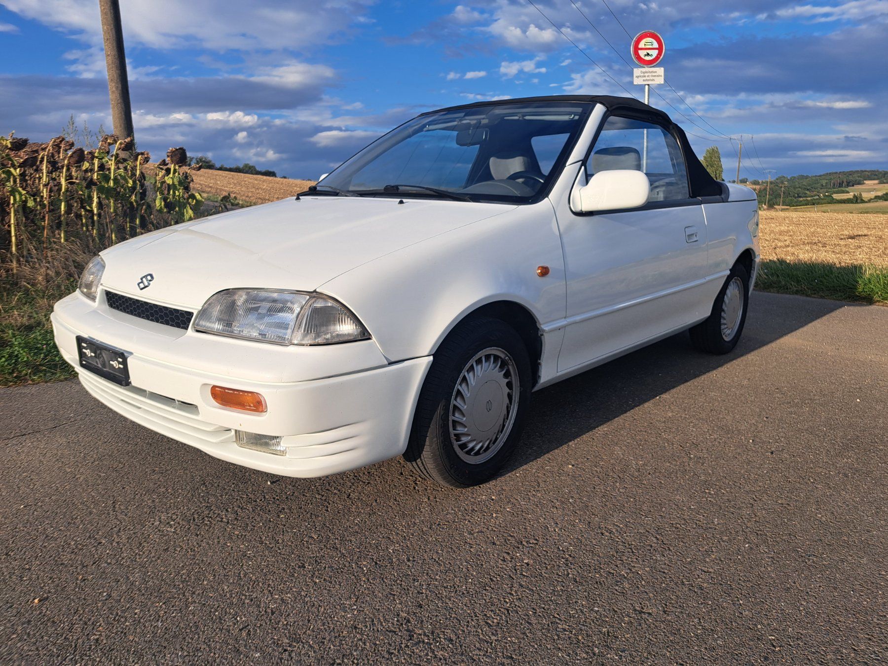 Suzuki Automobili: Cabriolet Suzuki Swift blanc – Usato da Bussigny venduto da pic_zs7v