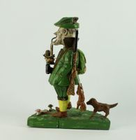 JÄGERFIGUR, HOLZ GESCHNITZT. MONOGRAMMIERT HF.