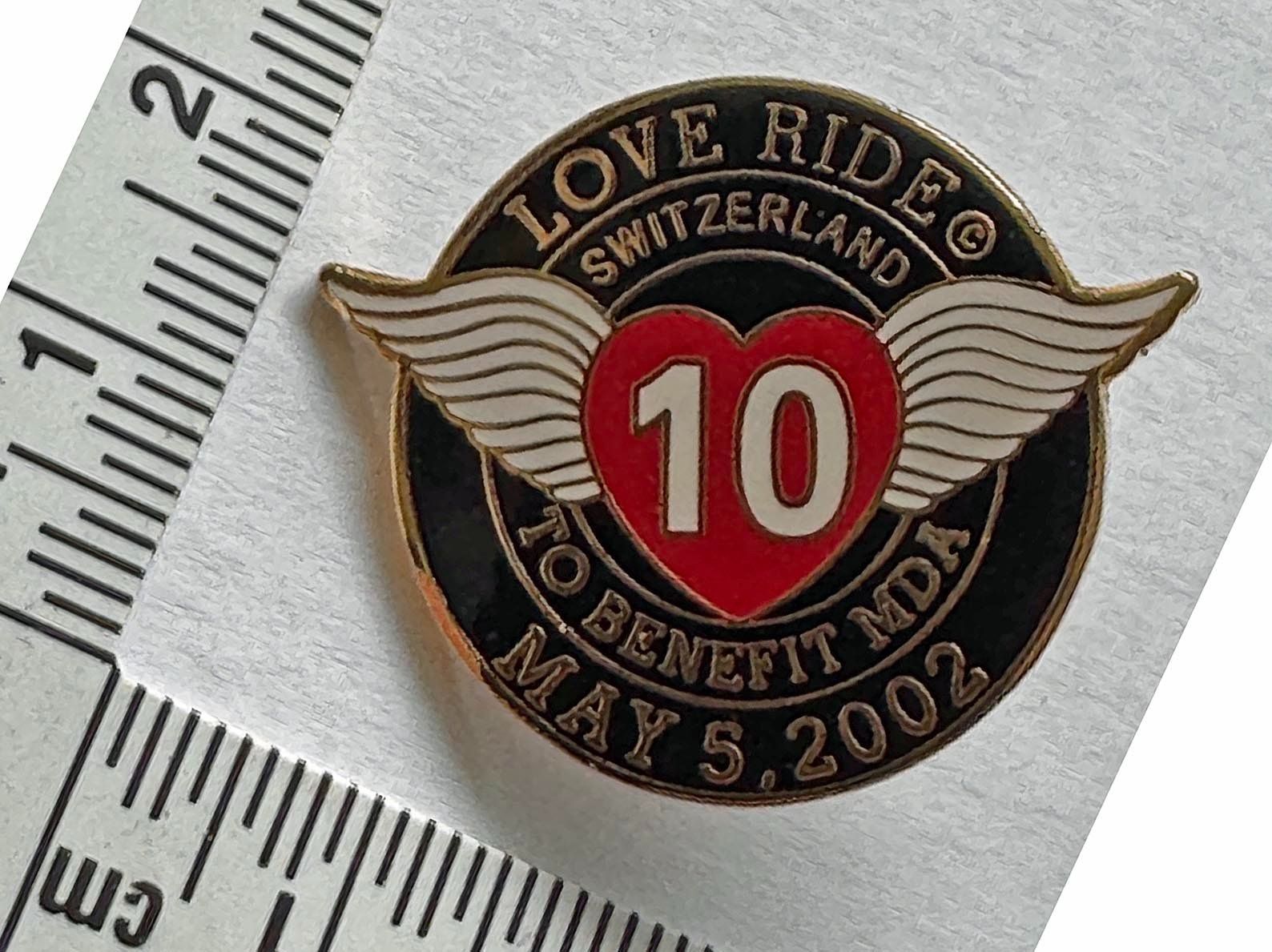 Placchette & Badge: 1 Pin Love Ride 10 – Usato da Zürich venduto da Policepatch