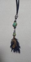 Collier avec pendantif plumes et grosses perles