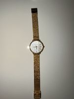 Montre Michael Kors dorée femme occasion
