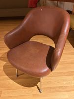Paire de fauteuils en skaï brun fabrication suisse DEM