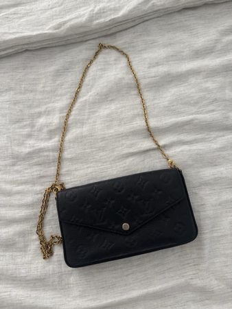 Louis Vuitton Clutch black embossed leather like new