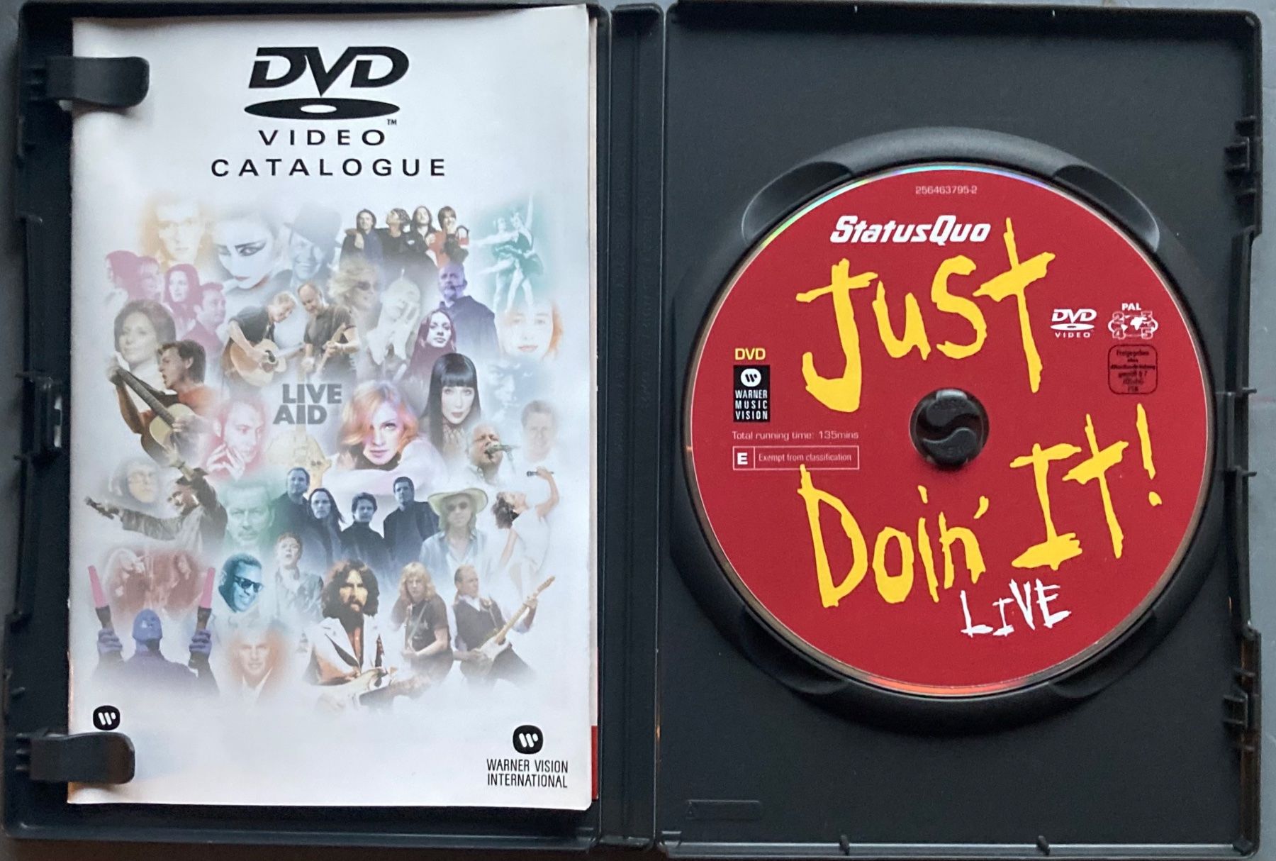 Tous les DVDs: STATUS QUO - JUST DOIN' IT LIVE – D'occasion à Poliez-Pittet par Newtown-Records 2