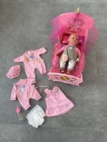 Puppenset mit Kleidern und Babybett von Zapf Creation
