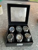 12 Modeische Herren Uhren in Aufbewahrungs Boxen 