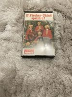Kassette D'Fischer-Chind spelid uf Helvetia MCH4302