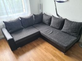 Ecksofa aus Stoff und Kunstleder schwarz meliert