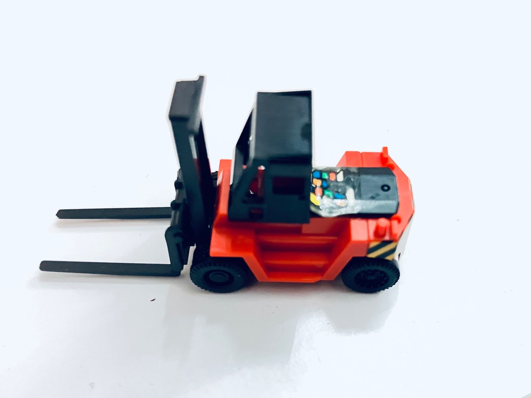 Modellini di ferrovie: KNIE Gabelstapler Model 1:150 Spur N #720 – Nuovo e nell'imballaggio originale da Oberbuchsiten venduto da Orsetto24 1