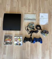Sony PlayStation 3 mit 2 Controllern und Spielen