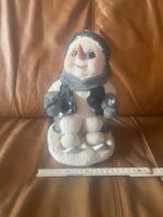 Schneemann auf Skiern