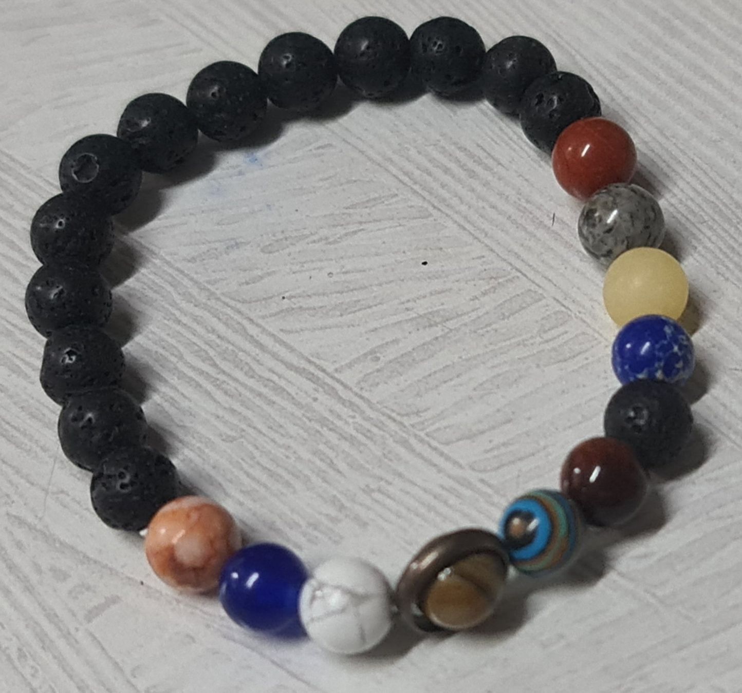 Bracciali & Braccialetti: Solar System Planeten Armband aus Stein – Nuovo e nell'imballaggio originale da Uerkheim venduto da Kaufoption 7
