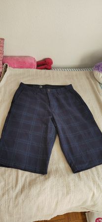 Shorts carreaux bleus Volcom taille 30 parfait pour l'été