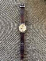 Montre Swatch bracelet  cadran argent