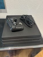 Sony PlayStation 4 Pro Konsole schwarz mit Controller