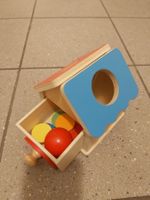 Spielzeug Holz Haus mit Kugeln und Scheiben