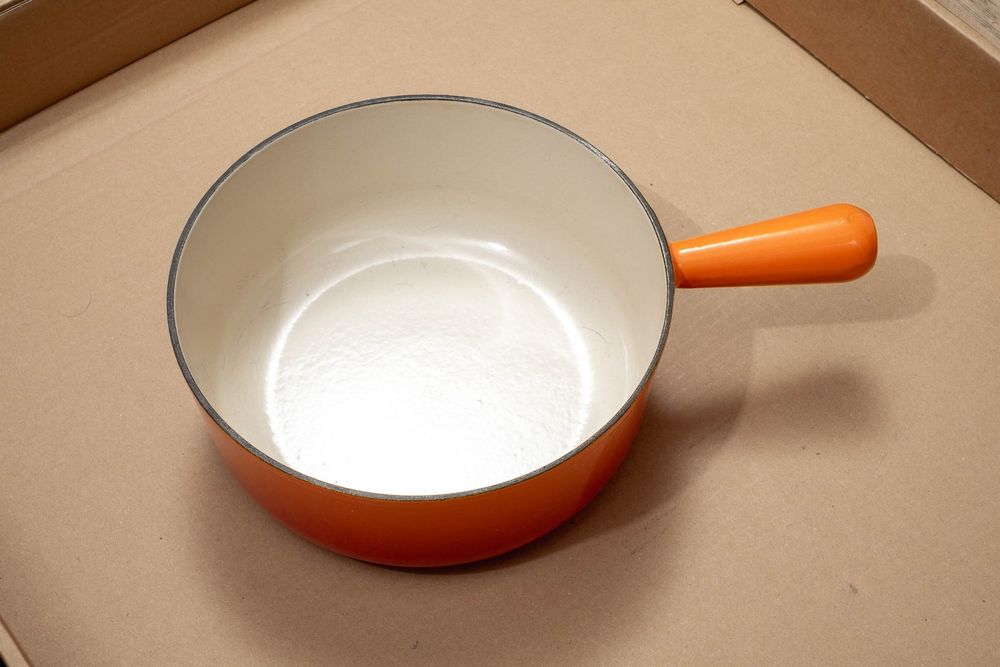 Caquelon à fondue Le Creuset en fonte Orange, diamètre 24 cm (D'occasion) à Morges pour CHF 85 – avec livraison | Acheter sur