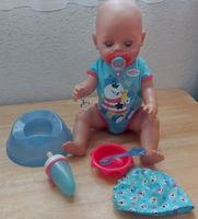 Baby born mit Trage