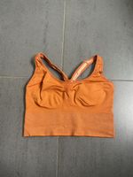 Brassière de sport orange, taille M