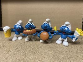 4 Schlumpf Figuren mit Essen guter Zustand