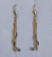 boucles d'oreilles  en or jaune et blanc 18 carats