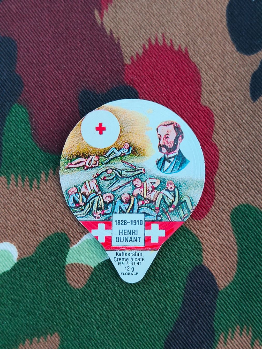Coperchi dei cremini per caffè: Kaffeerahmdeckel 1828-1910 HENRI DUNANT – Usato da Bauma venduto da SwissMilitaria