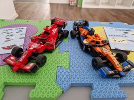 2 Formel 1 Rennwagen Klemmbausteine mit Anleitungen