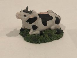 Tire-lire statuette vache souvenir Suisse
