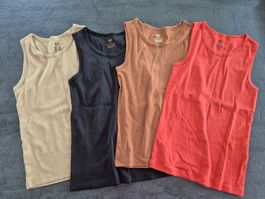 4 neue Unterhemden H&M Grösse 134/140