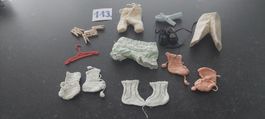 Viele kleine Puppenkleidchen 