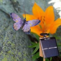 Schmetterling Solar auf Holzstab