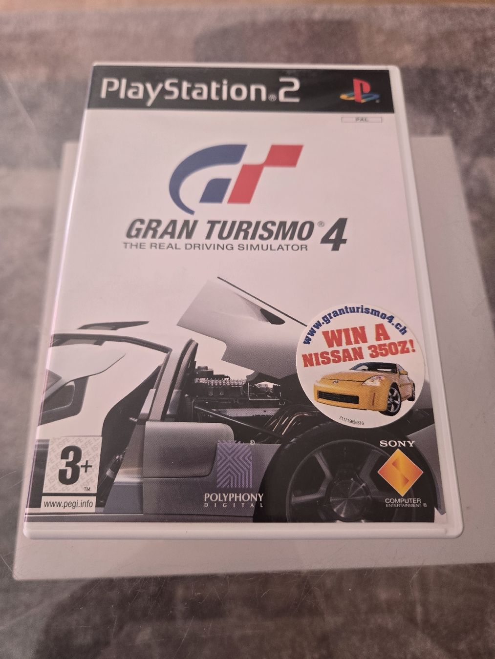 Jeux: Gran Turismo 4 PS2 – D'occasion à Bussigny par Kfdlt