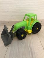 Tracteur en plastique robuste pour enfant.