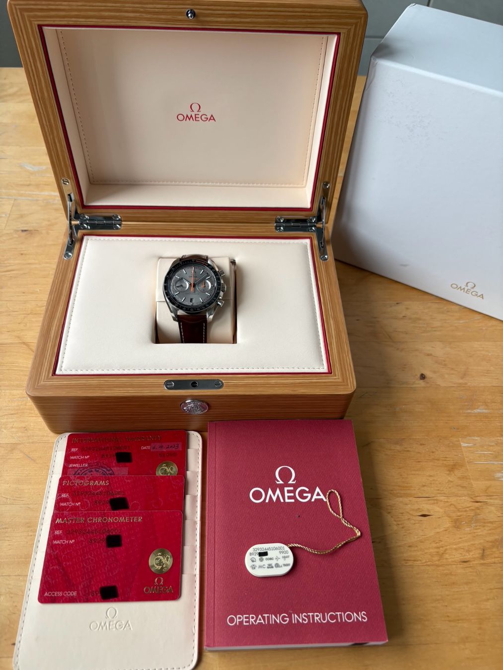 Omega Uhren: OMEGA Speedmaster Racing Fullset mit Garantie – Gebraucht aus Birsfelden von Mynos 1
