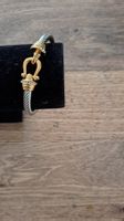 bracelet cable avec mousqueton doré