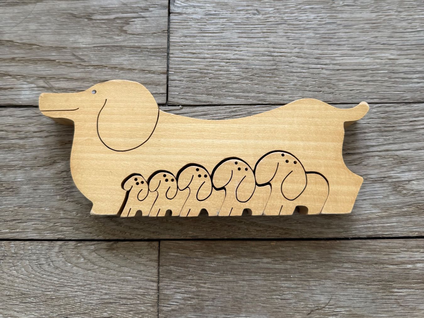 Naef Puzzle: Naef Dachshundpuzzle, Design Saburo Oguro – Usato da Luzern venduto da Mamutpe