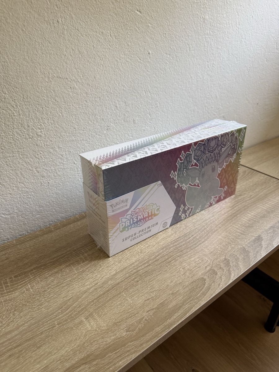 Pokémon Cartes à collectionner: Pokemon Prismatic Evolutions Super Premium Collection ENG – Neuf avec emballage d'origine à Gandria par PokeBrothersCH 1